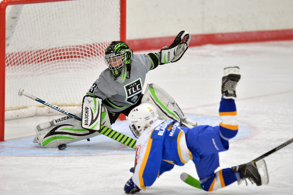 Youth hockey players in action